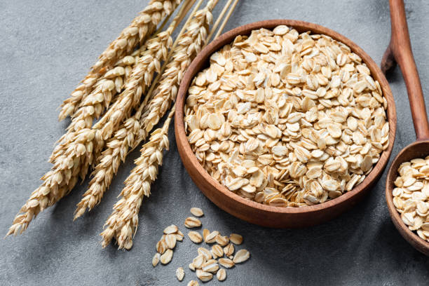 Rolled wheat porridge whole grain cereal, natural fiber-rich wheat flakes for daily breakfast.